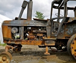 claims photo of burned up tractor